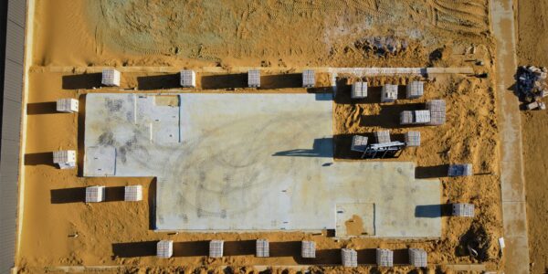 Commercial foundation excavation with concrete forms on a North Idaho job site